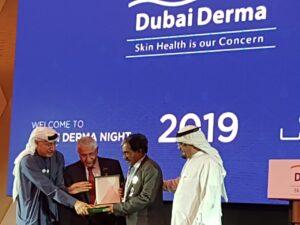 Dr Venkat was awarded in Dubai for his contribution to education of Dermatology